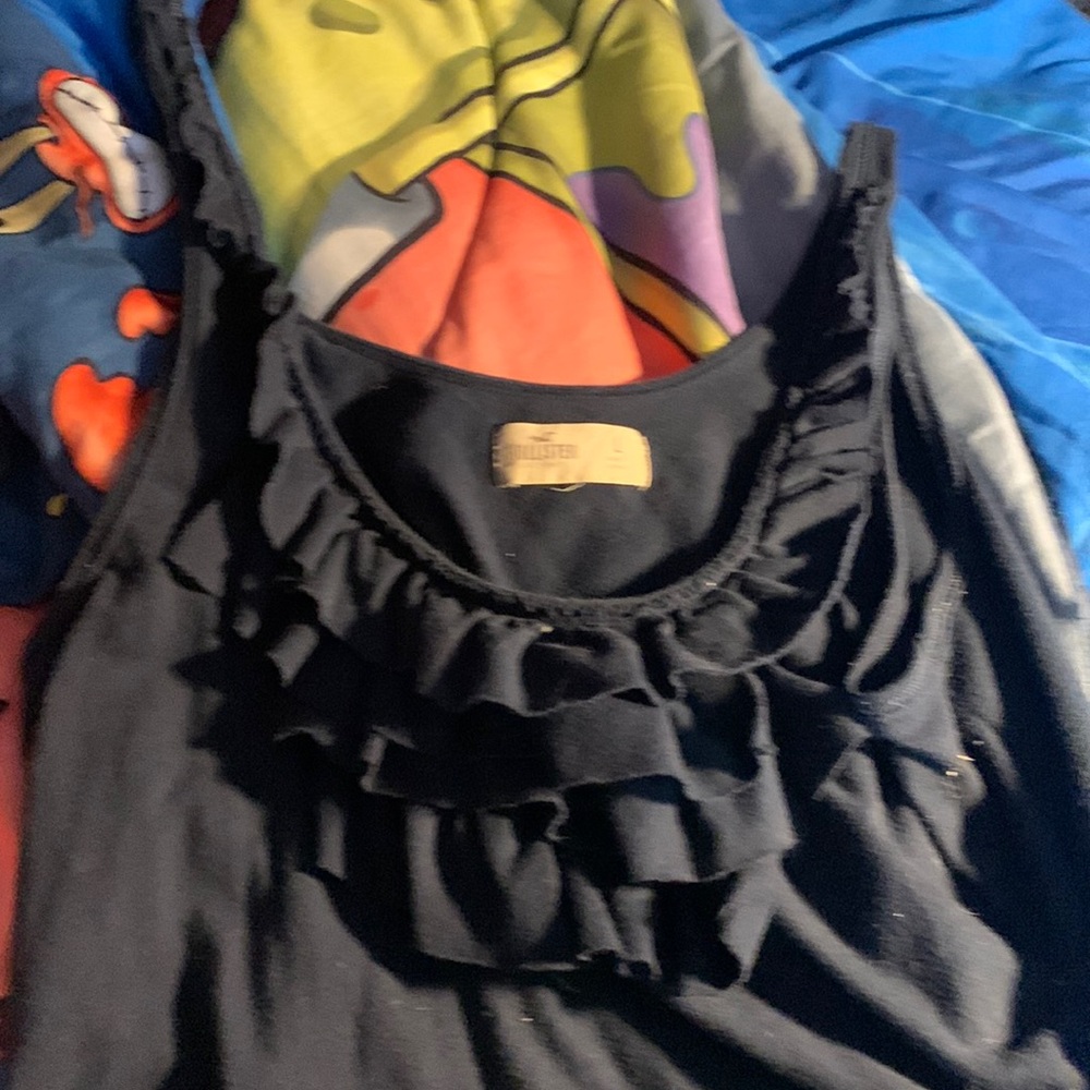 Tank top with ruffles on chest area